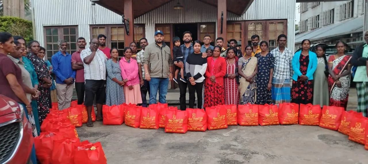 Volunteers packing relief supplies for families affected by Cyclone Ditwah.