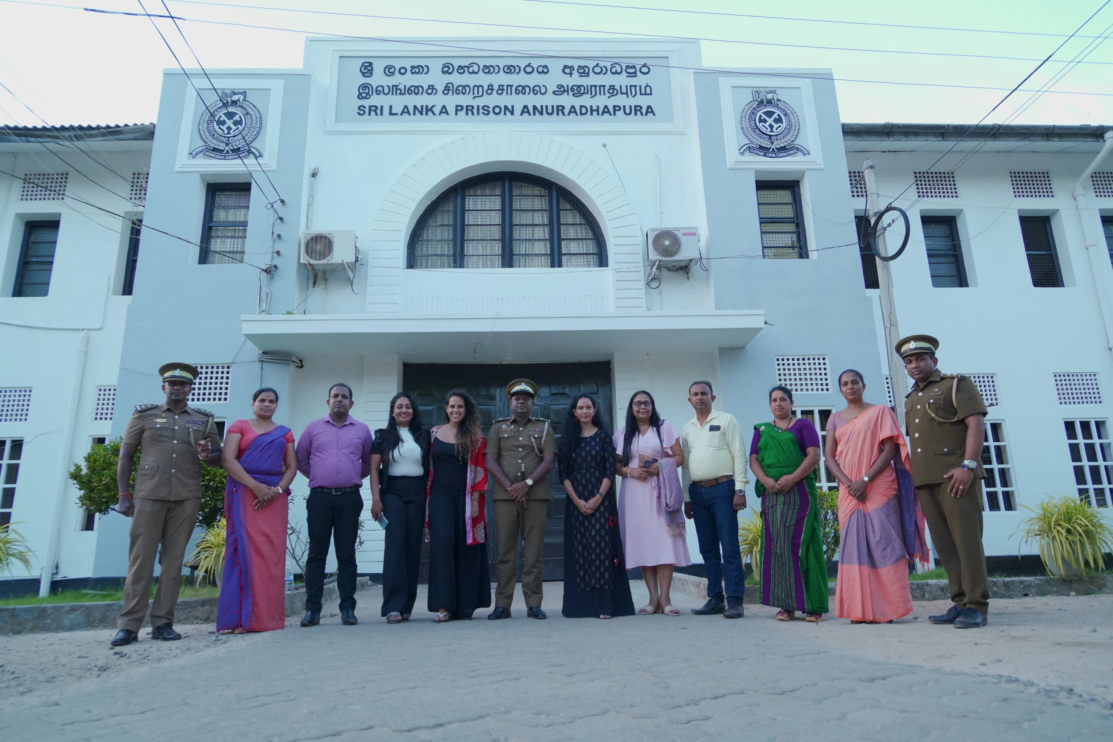 Infinite Grace Foundation staff and prison officers outside Sri Lanka Prison, Anuradhapura.